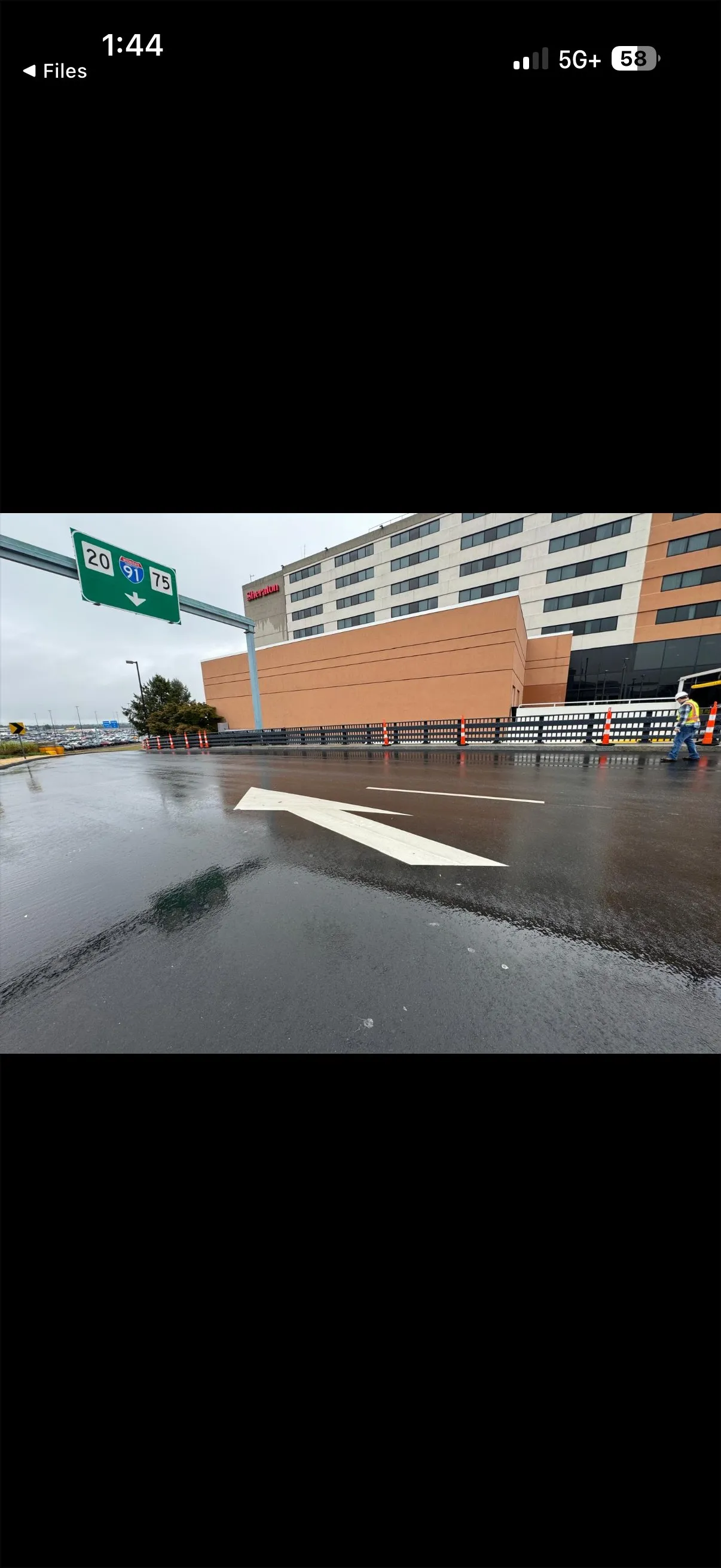 Bradley Airport infrastructure work showing finished guardrail and fencing installation
