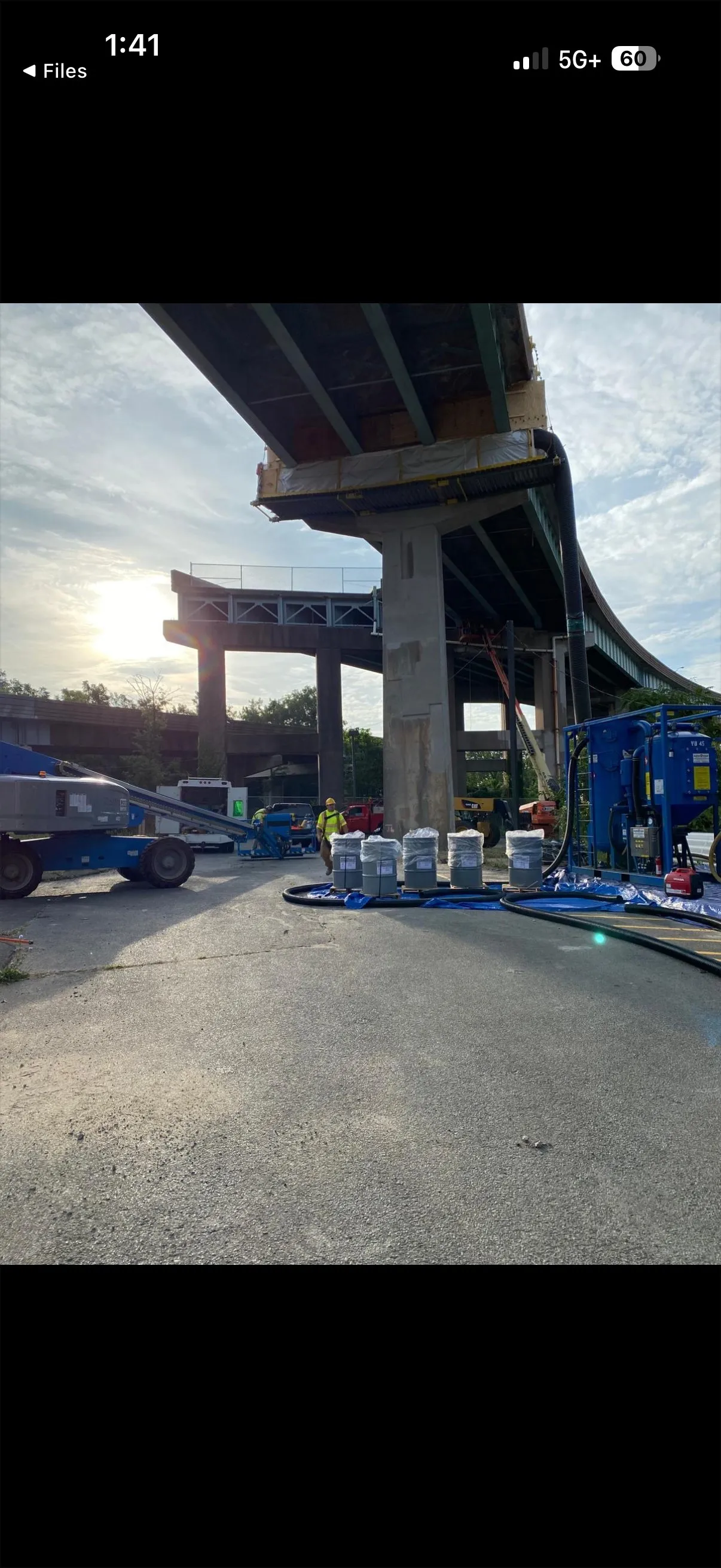 Painting preparation and coating application process on bridge infrastructure