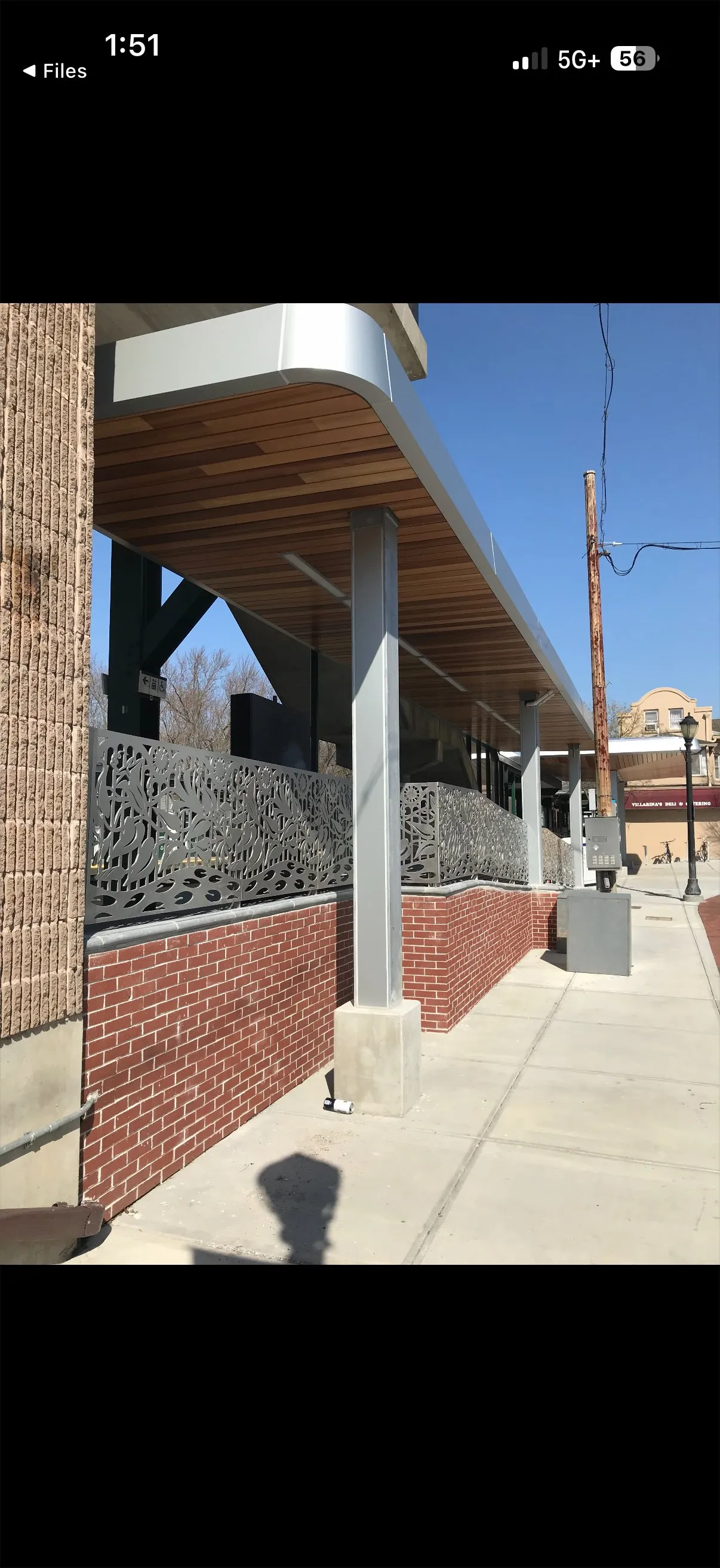 Commuter rail station with painted steel columns and completed interior infrastructure