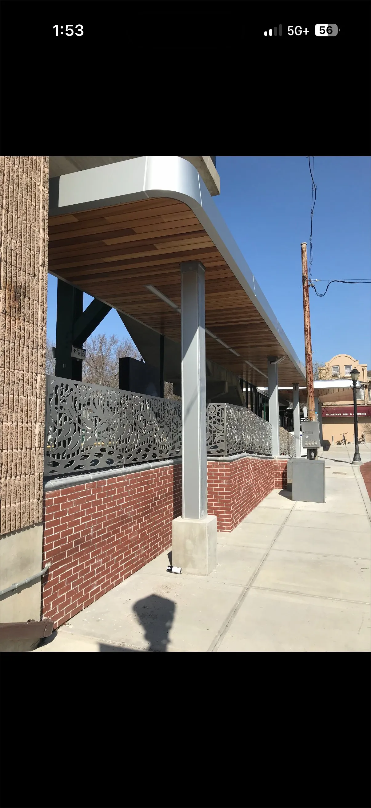 Railroad station exterior showing full paint scheme and protective coating on steel