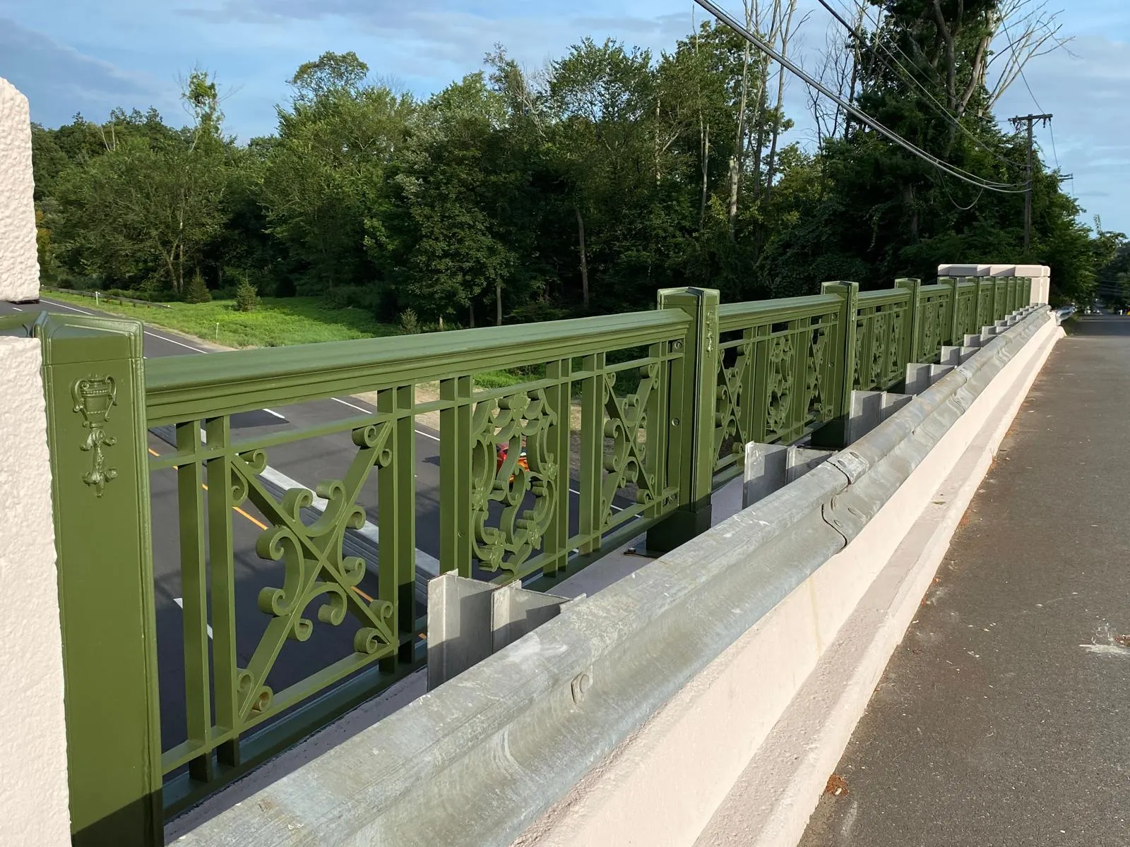 Ornamental green Art Deco bridge railing detail
