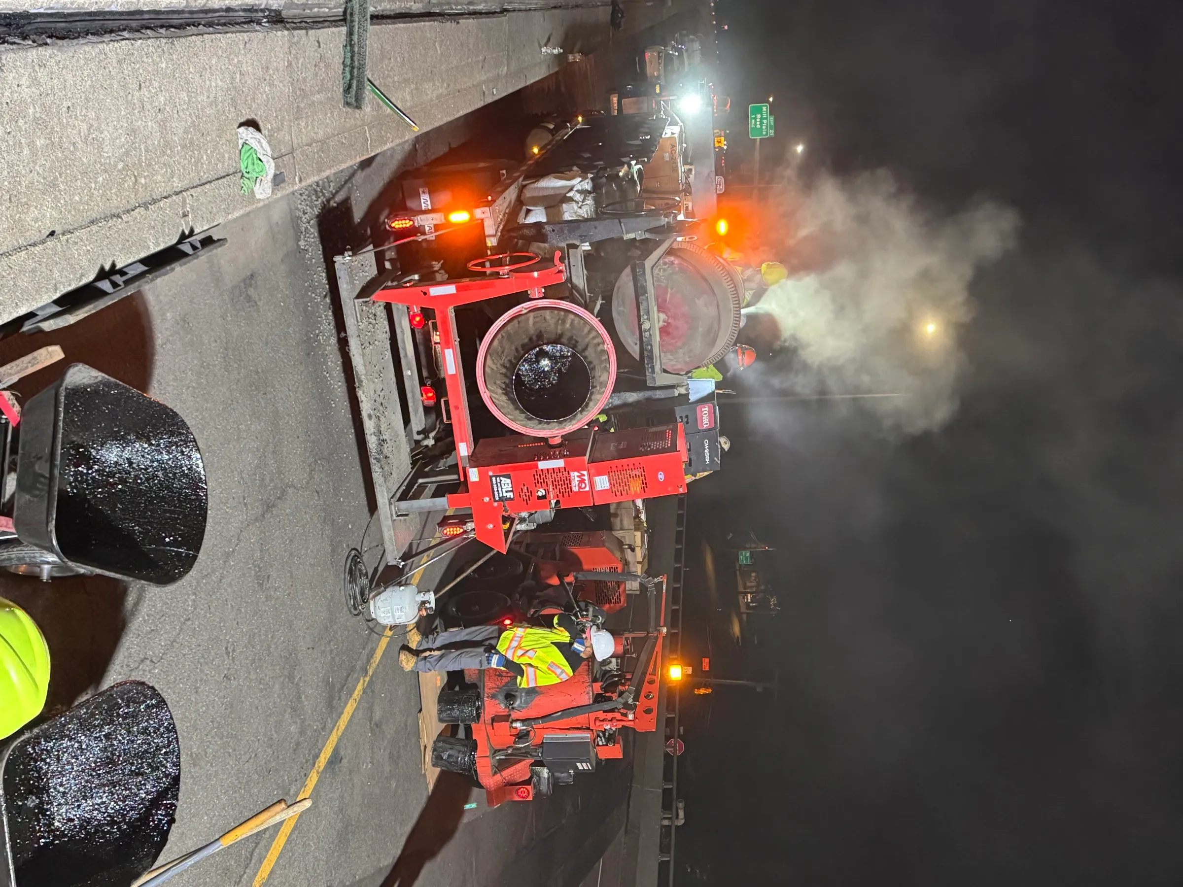 Cristiano & Son shot-blast equipment and crew preparing a bridge deck at night on an active CTDOT project