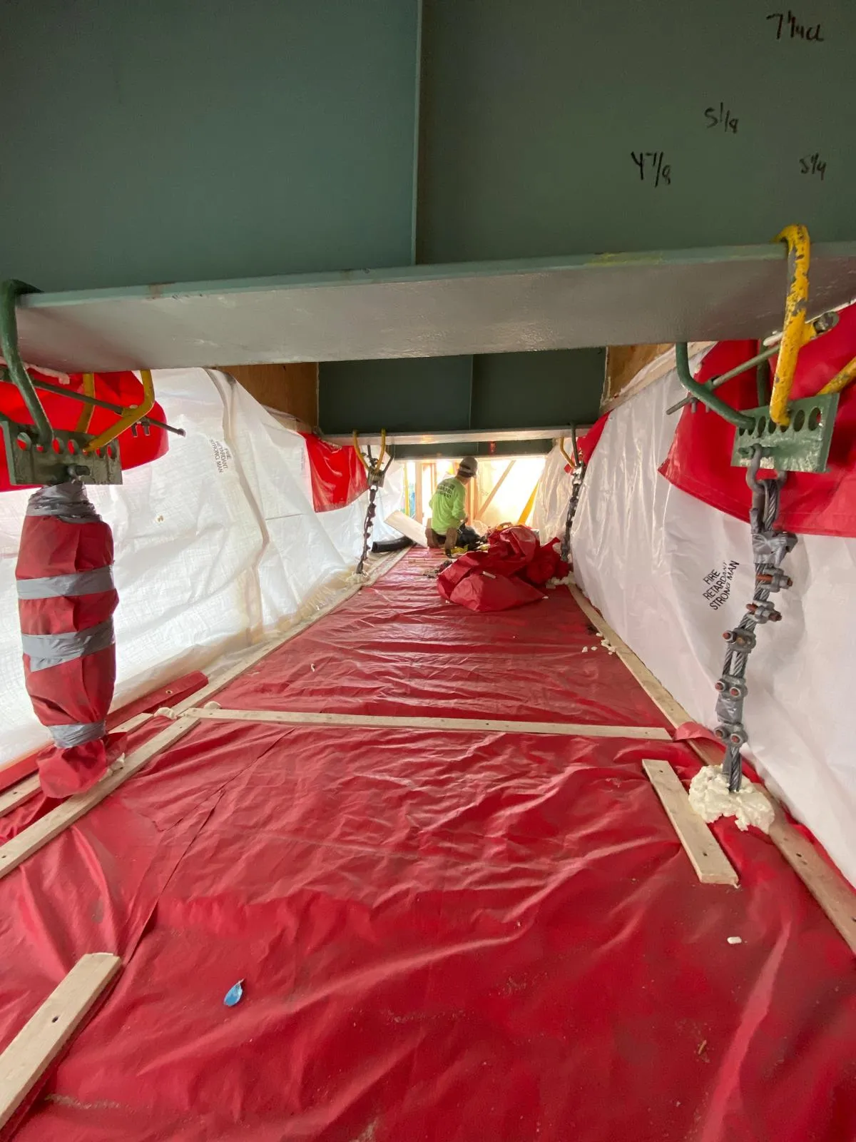 Lead paint containment enclosure interior with environmental protection